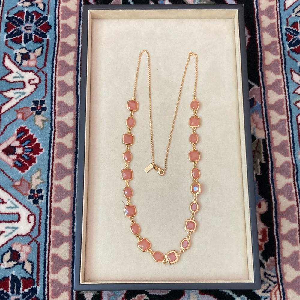 Kate Spade Necklace soft pink faceted stones bezel set in gold plated metal.
